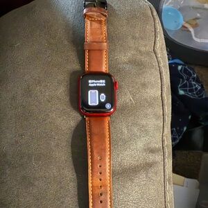 Red Smartwatch with Brown Leather Strap